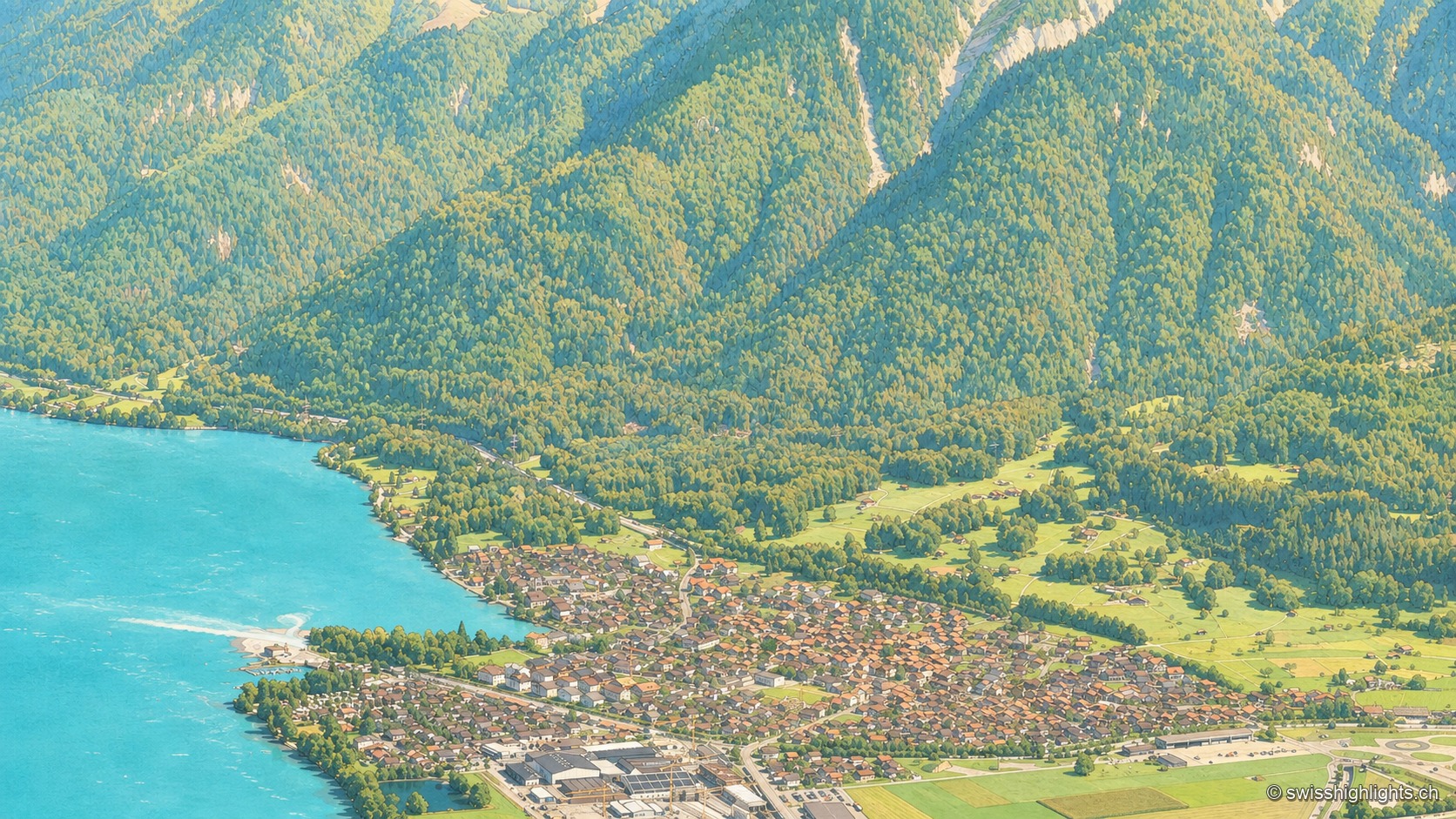 Vue aérienne depuis le Harderkulm sur le village de Bönigen, niché à l'embouchure turquoise de la Lütschine dans le lac de Brienz ; les toits du village s'alignent entre l'eau turquoise et des prés verts, au pied de versants abrupts entièrement boisés qui montent vers le fond de la vallée.