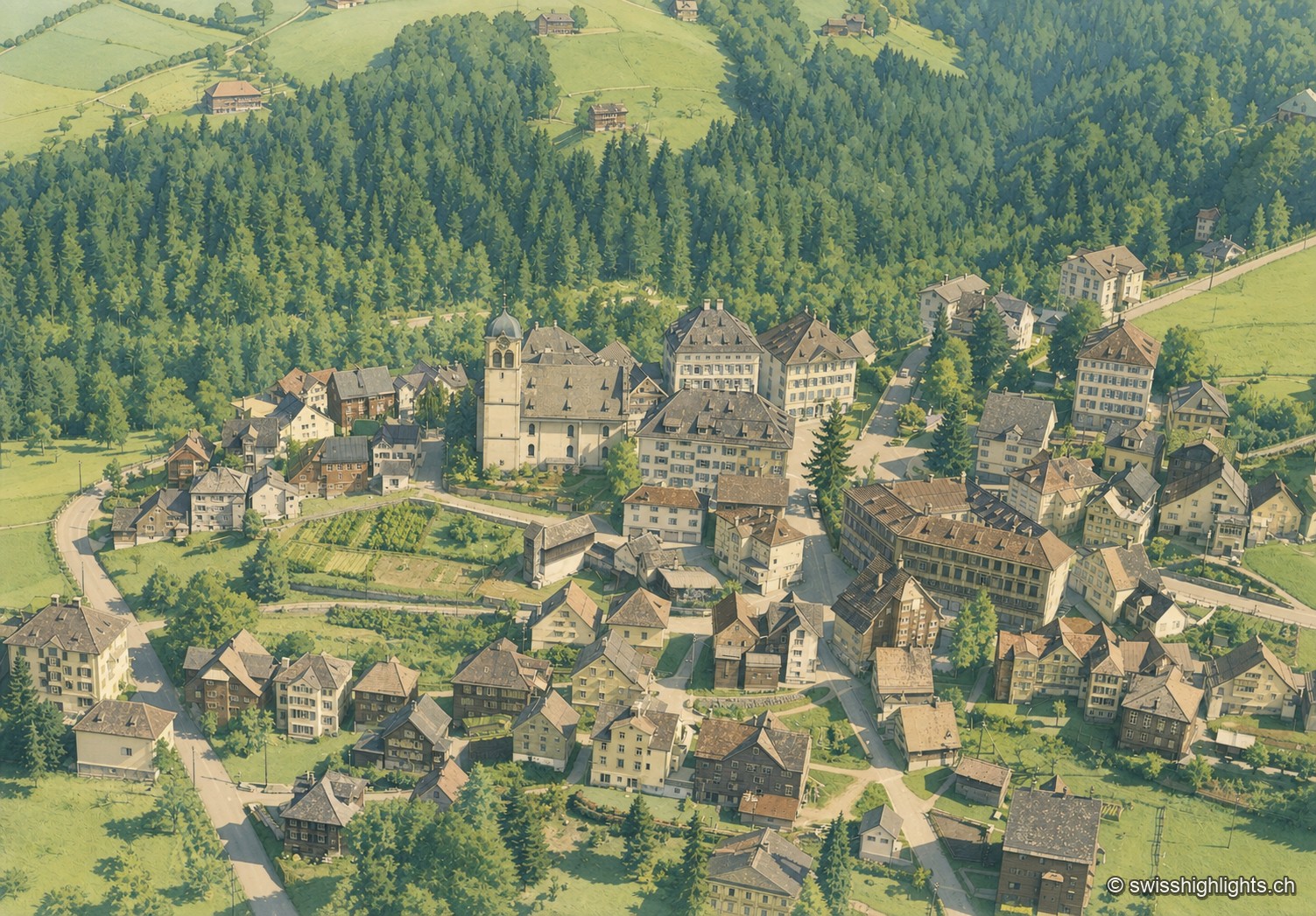 Vue aérienne du centre de Trogen : les maisons appenzelloises serrées le long des ruelles entourent le clocher de l'église et un grand bâtiment blanc à plan pentagonal, au milieu de prairies et de forêts sur les collines environnantes.